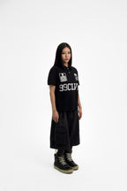 “RECOIL” POLO - BLACK