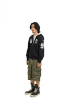 “RECOIL” VARSITY ZIP UP - BLACK